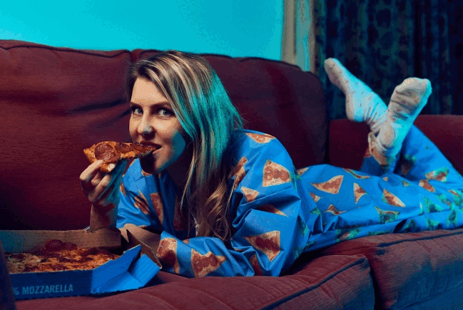 Domino's Made a 'Wipeable' Adult Onesie, So You Can Get Pizza All Over Yourself While Eating