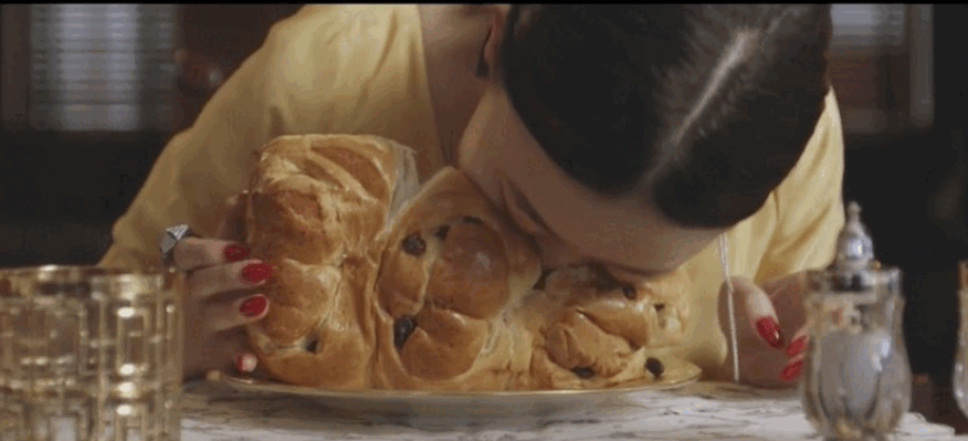 Bread Face Made an Ad for Jewelry While Mashing Her Face Into Baked Goods